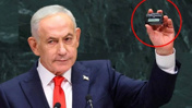 Netanyahu elindeki cihazla dünyayı tehdit etti! Boş salona konuşurken yüzü bile kızarmadı