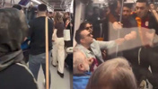 Küfürlü tezahürat metroyu karıştırdı: Oklavayla müdahale kamerada