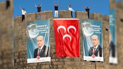 DEM Parti'nin kalesinde Bahçeli posteri: Bozkurt selamı verdiler