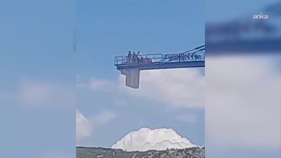 TOKİ inşaatında ücretleri verilmeyen 3 işçi vince çıkıp eylem yaptı!