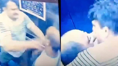 Asansör bir anda ringe döndü! Komşuların tekme tokat kavgası kamerada