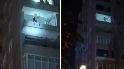 Balkona çıkıp dans eden kadın tüm mahalleyi ayağa kaldırdı! Polis itfaiye ambulans peş peşe gitti