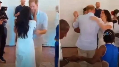 Meghan Markle ve Prens Harry'den tutkulu öpücük