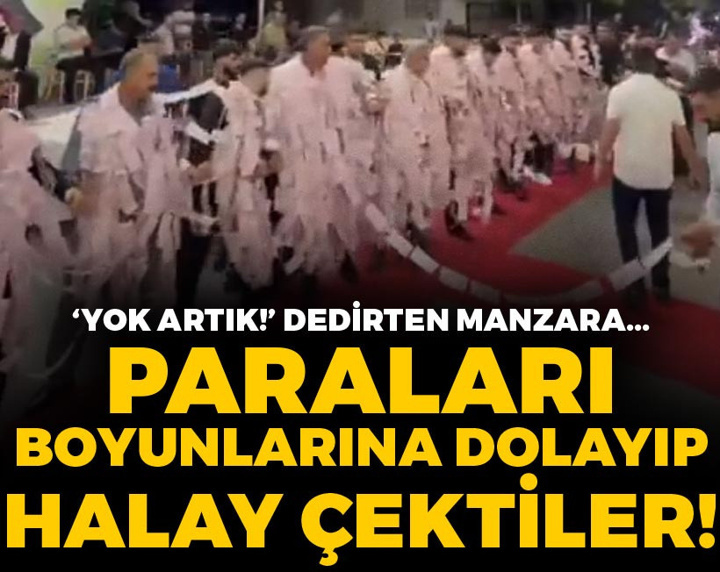 Paraları boyunlarına dolayıp halay çektiler
